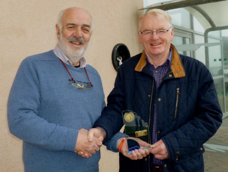 Bill Carne presents Brian Morris with Star of the Month trophy